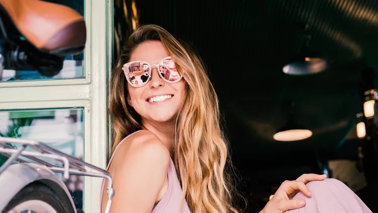 Happy girl with a bicycle