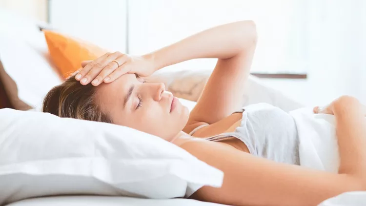 young-woman-on-bed-picture-id1017688716