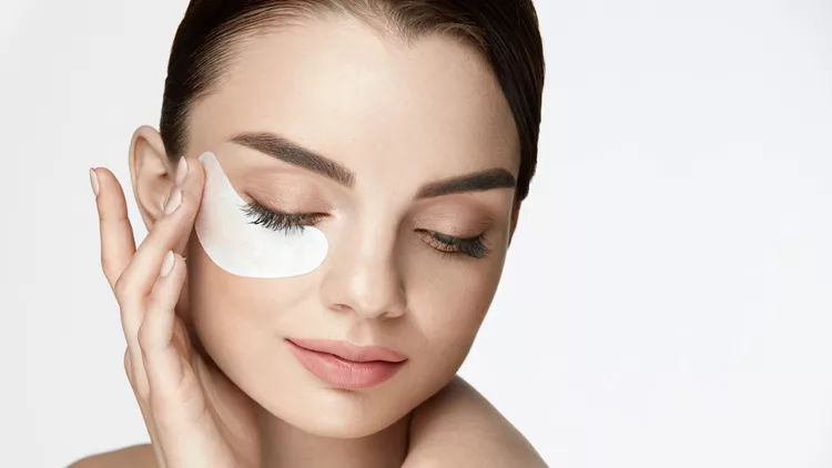 Patch Under Eye. Beautiful Woman With Under Eye Mask On Face