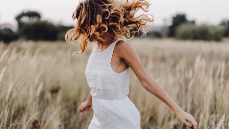 Young woman outdoor enjoying the sunset