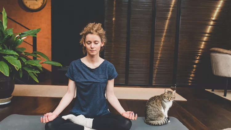 Practicing yoga at home