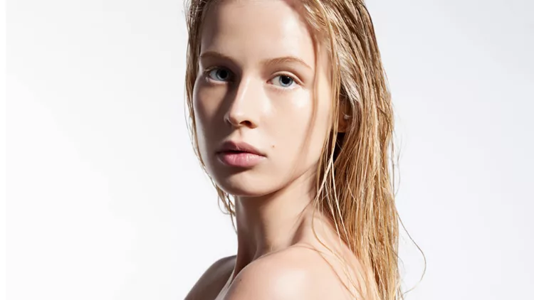 woman-with-pure-skin-and-wet-hair-picture-id487815850
