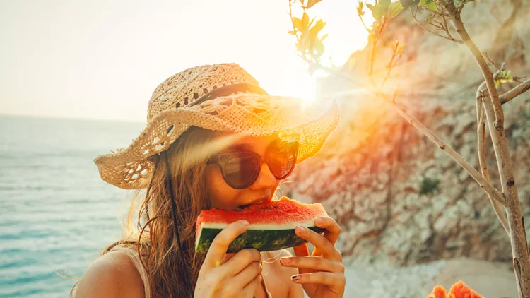 Eating and enjoying watermelon