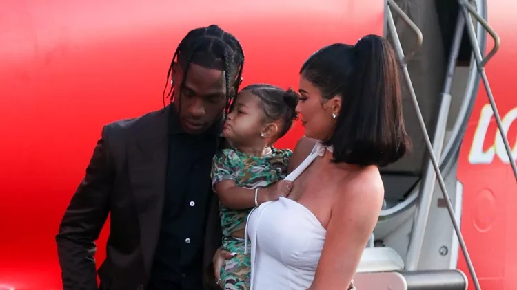 Stormi Webster Is So Cute As She Gives Her Dad Travis Scott A Kiss On The Cheek At The Red Carpet Premiere Of Netflix's "Look Mom I Can Fly" At The Barker Hanger In Santa Monica, CA