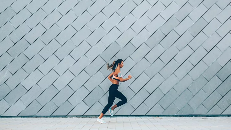 Fitness, Woman jogging in the city