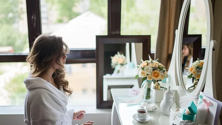 beautiful bride near a mirror