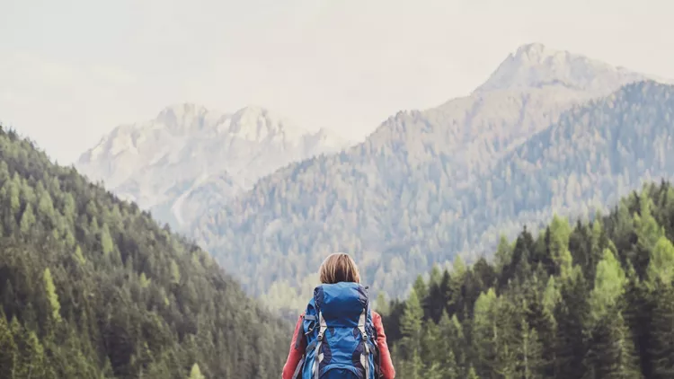Young woman traveler in a mountains