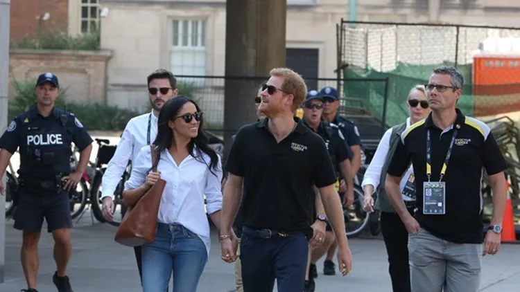 Prince Harry and Meghan Markle attend the Tennis together at the Invictus Games in Toronto