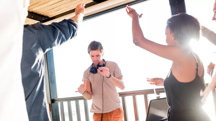 Cheerful Friends Dancing At An Outdoor Party