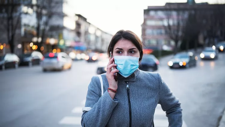 Woman With Wear Talking On The Phone.