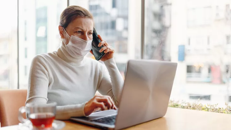 Portrait Of Mature  business  Woman With Face Mask