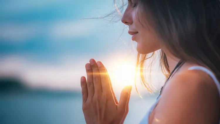 Meditating. Close Up Female Hands Prayer