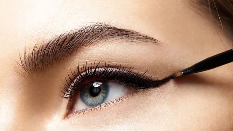 Make-up with black eyeliner close-up