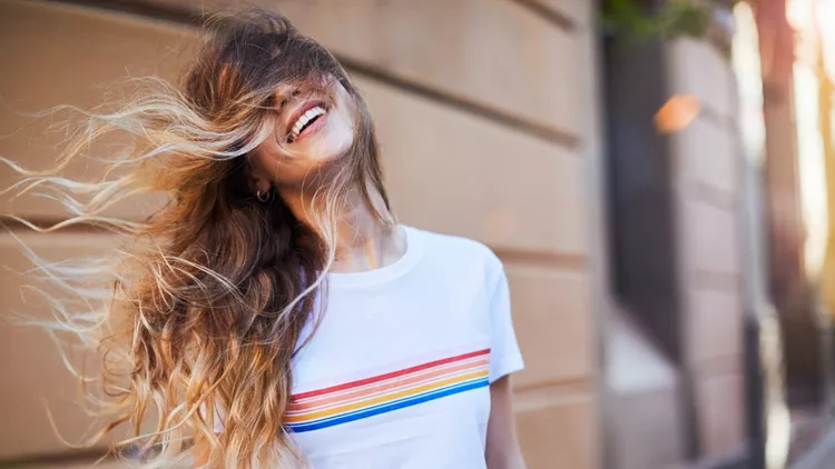 Young woman influencer posing for social media.