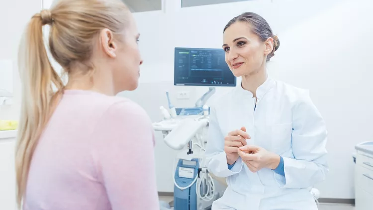 Woman at the gynecology examination with doctor