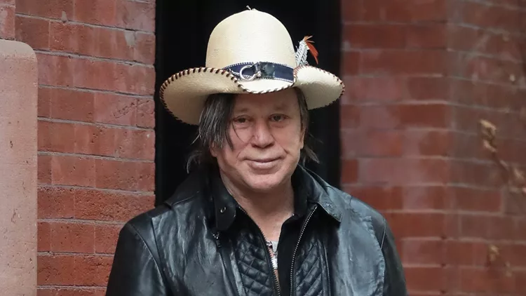 Mickey Rourke Walks His Dog In NYC