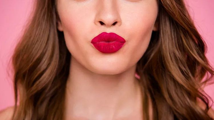 Cropped close up photo amazing beautiful she her lady attractive show ideal plump rose lips pomade lipstick hide eyes wear cute shiny colorful dress isolated pink rose bright vivid background.