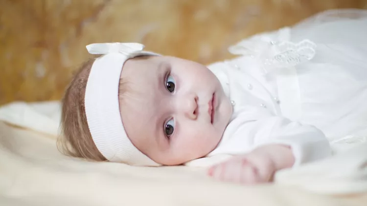 Church of Volotovo. Baptism of the Child. A child before the rite of baptism