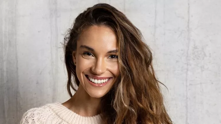 smiling-young-woman-feeling-happy-picture-id1169982283