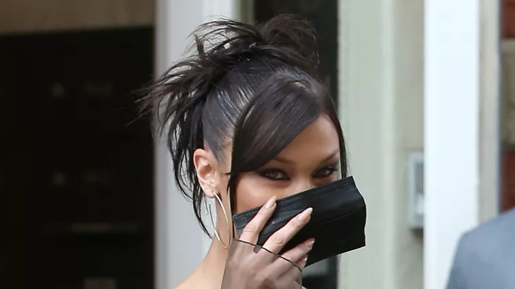 Model Bella Hadid Is Seen In A Sheer Silk Top, Black Pants And Strappy Studded Sandals As She Leaves For The VMA Awards In New York City