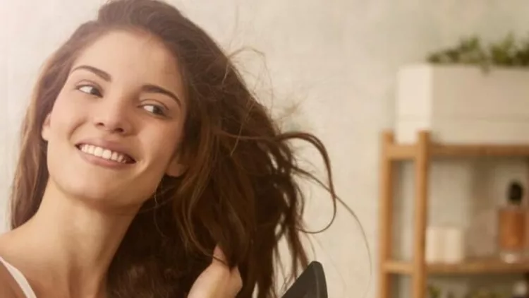 beauty-is-using-hairdryer-picture-id648760876