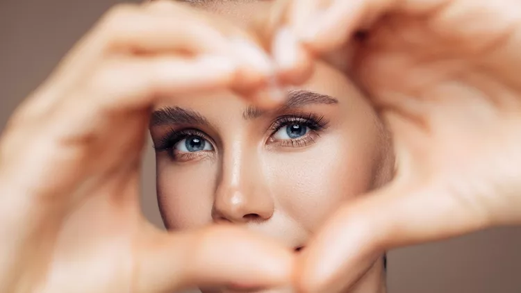 Beautiful Girl Showing Love Sign