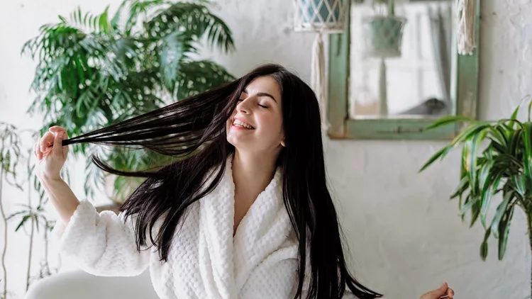 Young adult girl spending free time at home