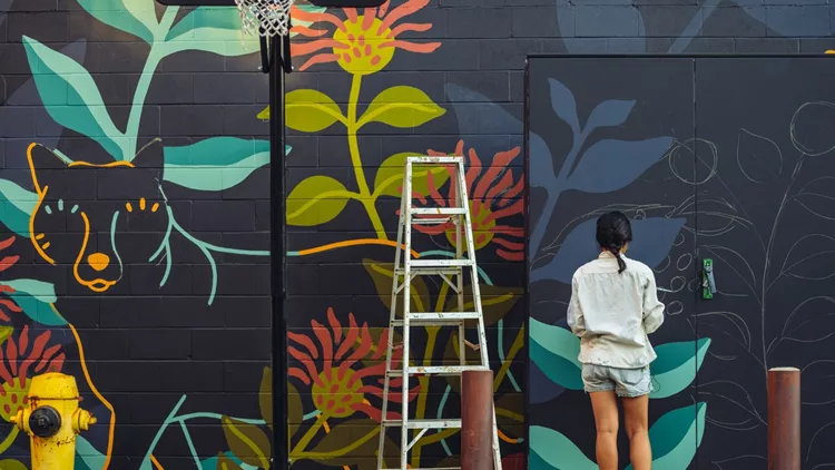 Mural artist at work