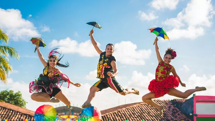 Dancers jumping in the Brazilian Carnival