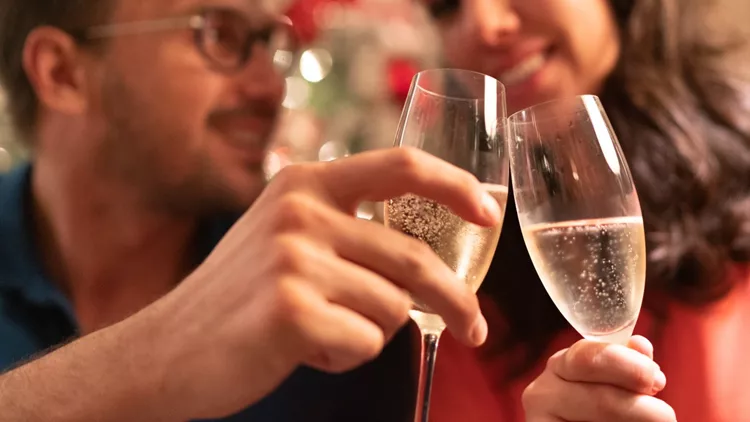 Married Couple Celebrating Christmas Time at Home