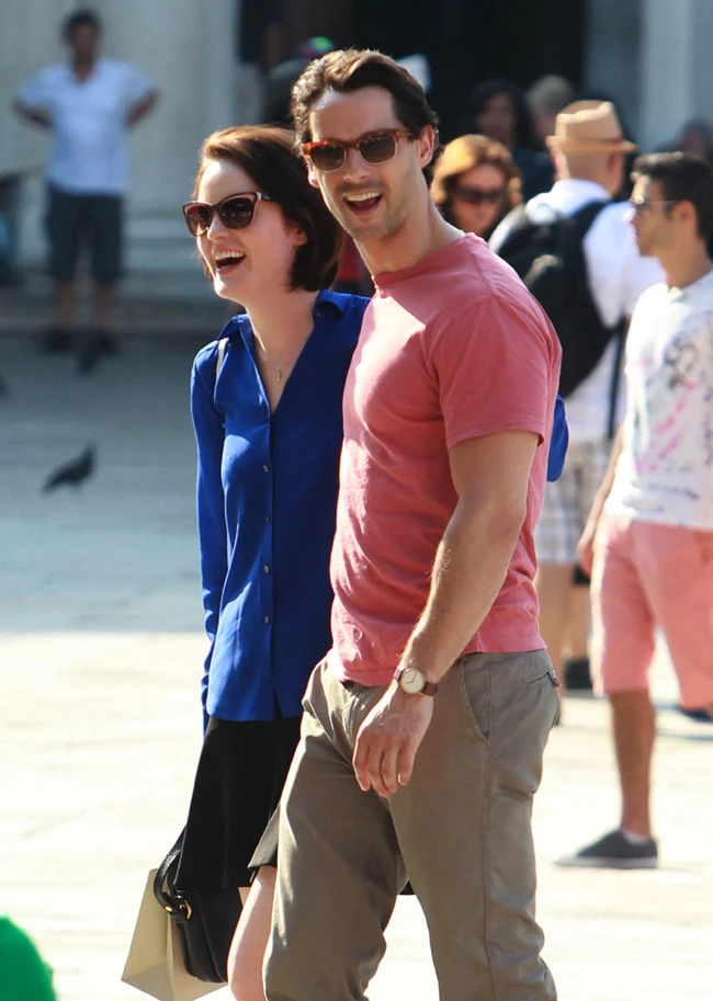 UK actress Michelle Dockery and her new boyfriend John Dineen are spotted in Venice, Italy, strolling on Saint Mark Square. Pictured: Michelle Dockery and John Dineen Ref: SPL603093 010913 Picture by: Maurizio La Pira / Splash News Splash News and Pictures Los Angeles:310-821-2666 New York:212-619-2666 London:870-934-2666 photodesk@splashnews.com 