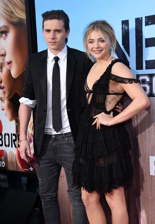 arriving to the "Neighbors 2" Los Angeles Premiere held at the Village Theatret in Westwood, CA. Pictured: Brooklyn Beckham and Chloe Grace Moretz Ref: SPL1274400 160516 Picture by: Digital Focus / Splash News Splash News and Pictures Los Angeles:310-821-2666 New York: 212-619-2666 London: 870-934-2666 photodesk@splashnews.com 