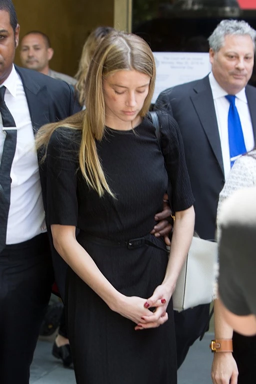Amber Heard leaves court in Downtown Los Angeles,CA. Amber Heard has been granted a temporary restraining order after accusing her estranged husband Johnny Depp of domestic abuse in a court filing. Amber had obvious bruises on her face and was visibly shaken by the ordeal. Pictured: Amber Heard Ref: SPL1287558 270516 Picture by: Splash News Splash News and Pictures Los Angeles:310-821-2666 New York: 212-619-2666 London: 870-934-2666 photodesk@splashnews.com 