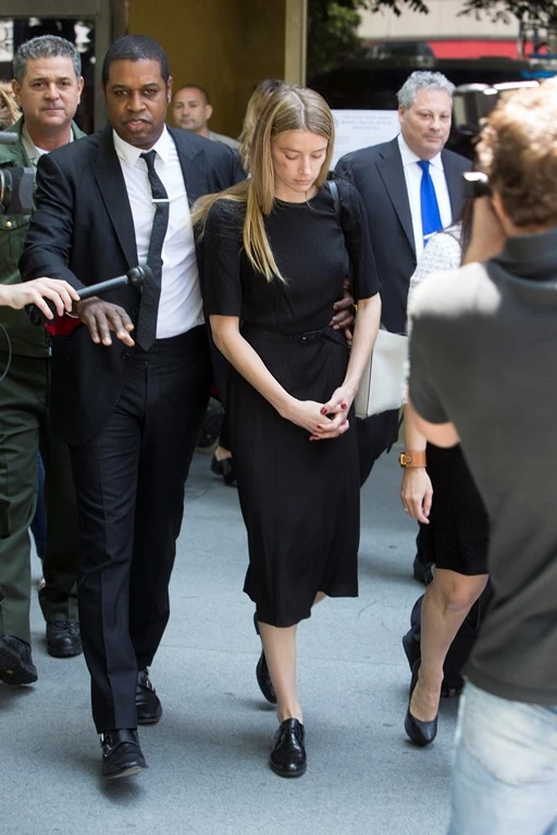 Amber Heard leaves court in Downtown Los Angeles,CA. Amber Heard has been granted a temporary restraining order after accusing her estranged husband Johnny Depp of domestic abuse in a court filing. Amber had obvious bruises on her face and was visibly shaken by the ordeal. Pictured: Amber Heard Ref: SPL1287558 270516 Picture by: Splash News Splash News and Pictures Los Angeles:310-821-2666 New York: 212-619-2666 London: 870-934-2666 photodesk@splashnews.com 