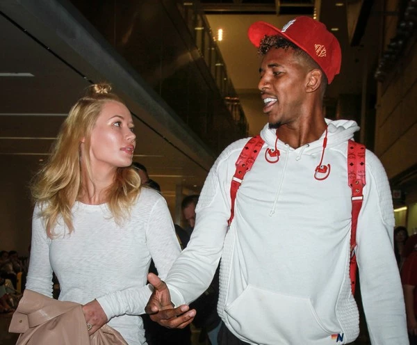 Iggy Azalea and Nick Young seen at LAX airport in Los Angeles, California. Pictured: Iggy Azalea and Nick Young Ref: SPL1104124 160815 Picture by: Diabolik / Splash News Splash News and Pictures Los Angeles:310-821-2666 New York: 212-619-2666 London: 870-934-2666 photodesk@splashnews.com 