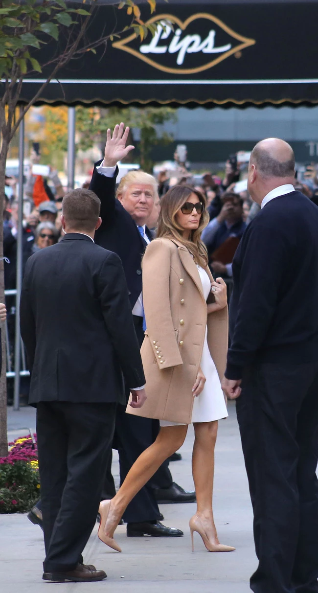 Donald Trump arrives with wife Melania Trump to vote at the polls as he holds her hand and touches her back gently as they arrive with Ivanka and family on Election Day in New York City. Donald waved to the constuction workers down the street and Melania showed her fashion sense as did Ivanka who arrived with her daughter Arabella and husband Jared Kushner. Donald then walked by the LIPS drag queen restaurant on his way inside as he gave a wave to the media and fans that cheered for him on his arrival and exit. Pictured: Donald Trump, Melania Trump, Ivanka Trump, Arabella, Jared Kushner Ref: SPL1388340 081116 Picture by: Brian Prahl / Splash News Splash News and Pictures Los Angeles: 310-821-2666 New York: 212-619-2666 London: 870-934-2666 photodesk@splashnews.com 