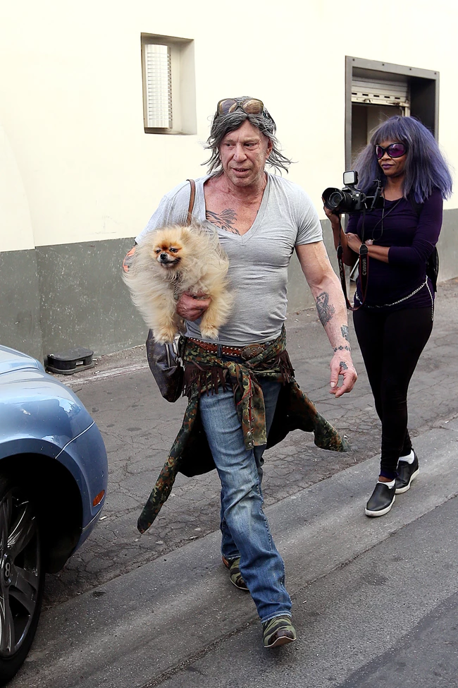 Mickey Rourke walking to his car with his puppy in Beverly Hills, CA Pictured: Mickey Rourke Ref: SPL1372843 121116 Picture by: Splash News Splash News and Pictures Los Angeles:310-821-2666 New York: 212-619-2666 London: 870-934-2666 photodesk@splashnews.com 