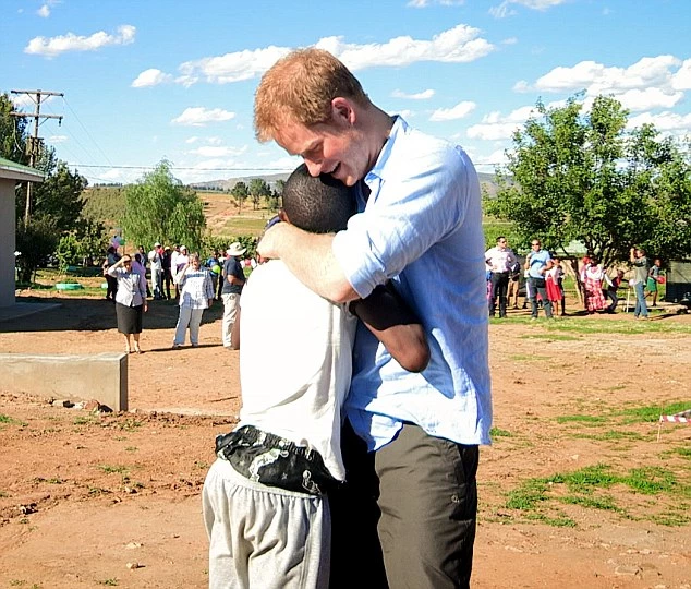 STRICTLY EMBARGOED: FOR PUBLICATION ON SUNDAY 18TH DECEMBER 2016  From Big Earth Productions  PRINCE HARRY IN AFRICA Monday 19th December 2016 on ITV  Screen grab shows : The moment that Prince Harry is reunited with Mutsu aged 15yrs  ,in November 2015 Mutsu is a local teenager who the Prince met on his first visit to Lesotho, and with whom he has since remained in regular contact This brand new film for ITV follows HRH Prince Harry on his return to Lesotho, in Africa, to continue the work of Sentebale, the charity he set up in the country a decade ago.  Prince Harry first travelled to the little known kingdom of Lesotho 12-years ago, shadowed by broadcaster Tom Bradby. It was there, after seeing the country's disadvantaged children, that the Prince decided to follow in the humanitarian footsteps of his mother, Diana, Princess of Wales, and set up Sentebale (translated as Forget Me Not), which provides care, support and education to youth affected by HIV and AIDS in Lesotho and Botswana. This film will see Prince Harry set off on an unforgettable adventure, where cameras will bear witness to his travels through the beautiful and challenging scenery to remote locations with his deeply personal aim of discovering the stories that he wants to tell to the world. The film will also capture the moment that Prince Harry is reunited with Mutsu, a local teenager who the Prince met on his first visit to Lesotho, and with whom he has since remained in regular contact, both knowing firsthand what is was like growing up without a parent. Featuring footage of Prince Harry getting his hands dirty helping out with the charity's work on the ground and interacting with the local children, the film will discover how the Prince has come to have such an understanding of their problems and how this led him to set up his own initiative, with the aim of supporting orphans and vulnerable children and helping them through education.  Also, in an interview with Bradby, the Prince will reveal his motives for setting up the charity, his passion for the future of his work in Africa, and how he's determined to use his unique position to do good. © Big Earth Productions  Photographer Chris Jackson  For further information please contact Peter Gray 0207 157 3046 peter.gray@itv.com  This photograph is © Big Earth Productions and can only be reproduced for editorial purposes directly in connection with the programme PRINCE HARRY IN AFRICA or ITV. Once made available by the ITV Picture Desk, this photograph can be reproduced once only up until the Transmission date and no reproduction fee will be charged. Any subsequent usage may incur a fee. This photograph must not be syndicated to any other publication or website, or permanently archived, without the express written permission of ITV Picture Desk. Full Terms and conditions are available on the website www.itvpictures.com