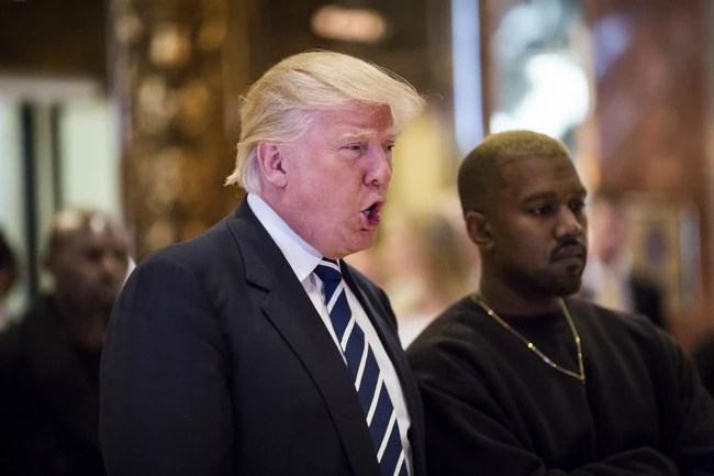 U.S. President-elect Donald J. Trump and Musician Kanye West pose for photographers in the lobby of Trump Tower in Manhattan, New York City, NY, USA, on Tuesday, December 13, 2016. Photo by John Taggart/Pool/ABACAPRESS.COM  | 575045_015 New York City Etats-Unis United States